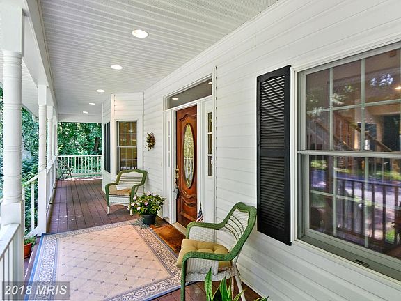 Charming wrap around covered front porch!