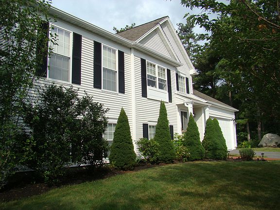 Easy care vinyl siding and tilt in windows