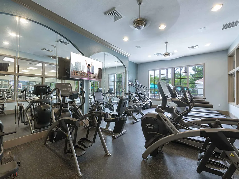 24-hour fitness center with strength and cardio equipment