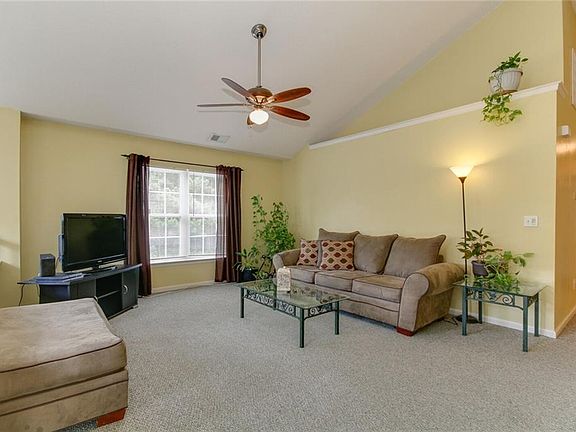 Cozy den perfect for entertaining.