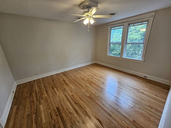 Huge master bedroom (empty) with large walk-in closet