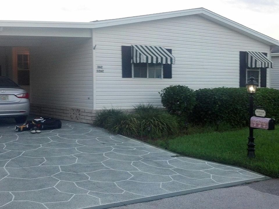 Front of House with carport