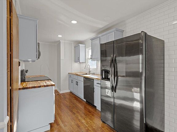 Butcher block counters and SS appliances.