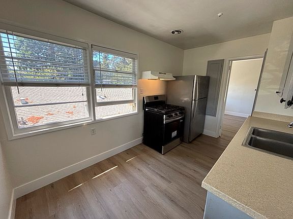 Kitchen, New floors and stove, matching fridge