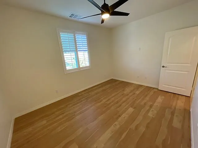 Bedroom is spacious. Newer flooring, Window shutters