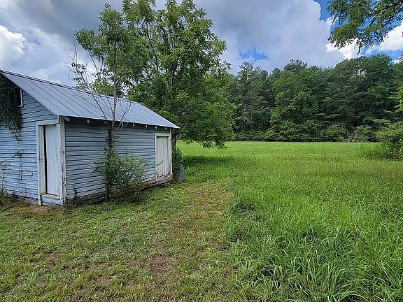 Old smokehouse and pasture