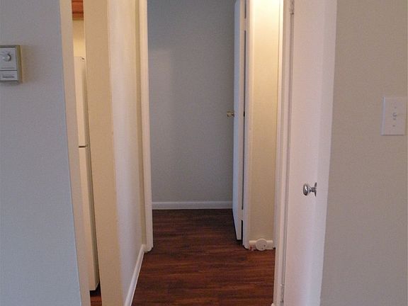 Hallway to kitchen, bedrooms, and bathroom.