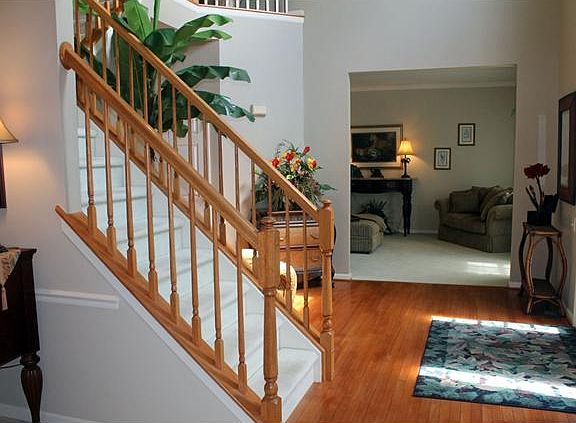 view from dining room thru foyer into living room