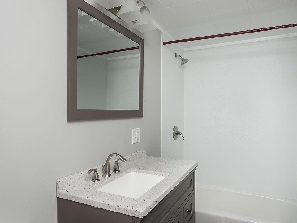 bathroom with brand new vanity and shower surround