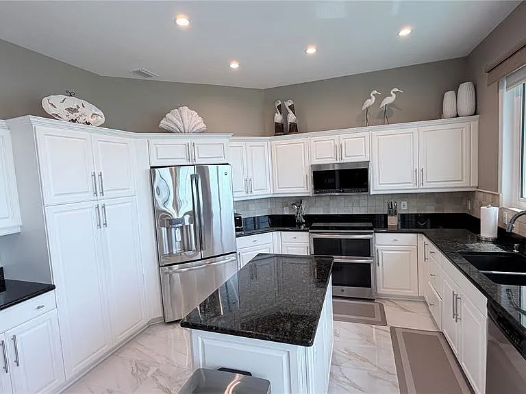 218 Sand Key Estates Dr — Photo 30