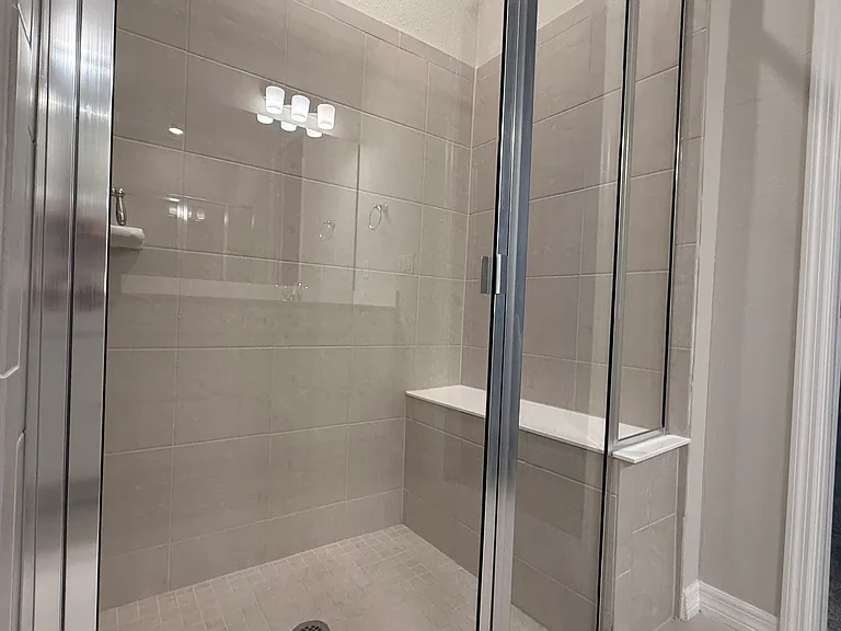 Super shower with bench glass doors!