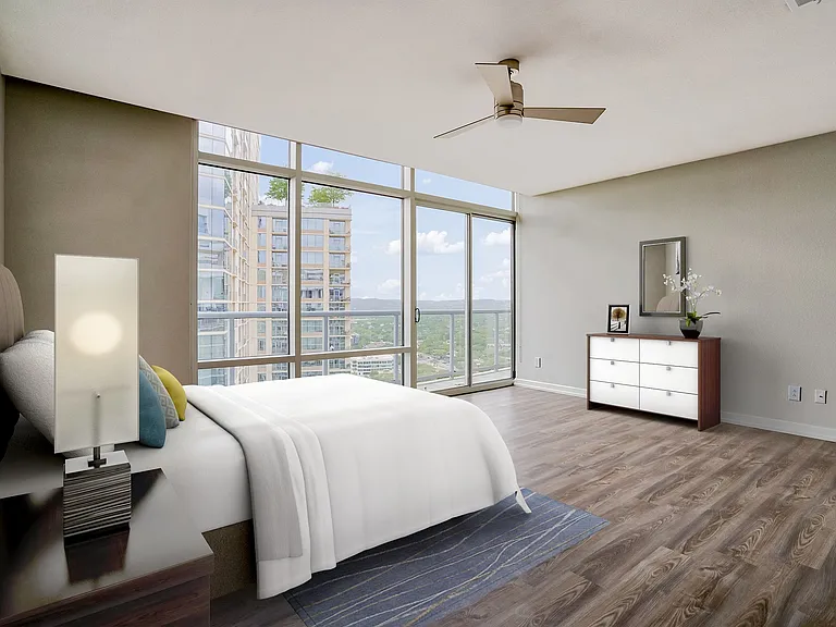 Penthouse bedrooms are complete with large windows for ample natural light