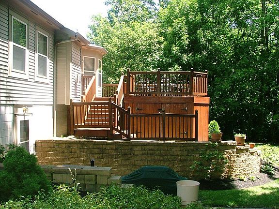 Large deck with incredible storage underneath, paver patio