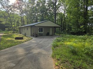 8207 N Hunters Ridge Dr, Irons, MI 49644