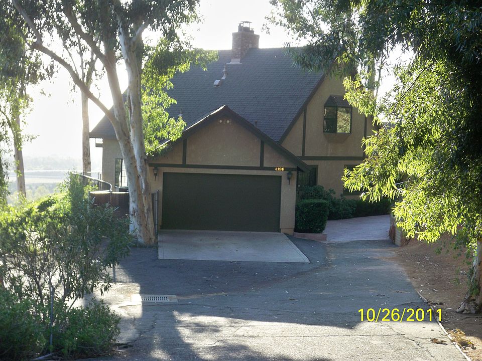 BACK OF HOUSE,PARKING AREA