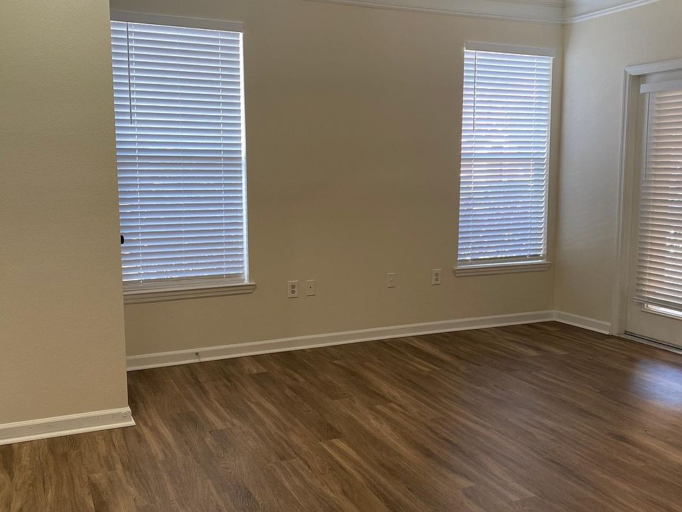 Large living room with luxury vinyl plank floors