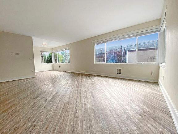 Large living/dining area with many large windows with southern exposure!