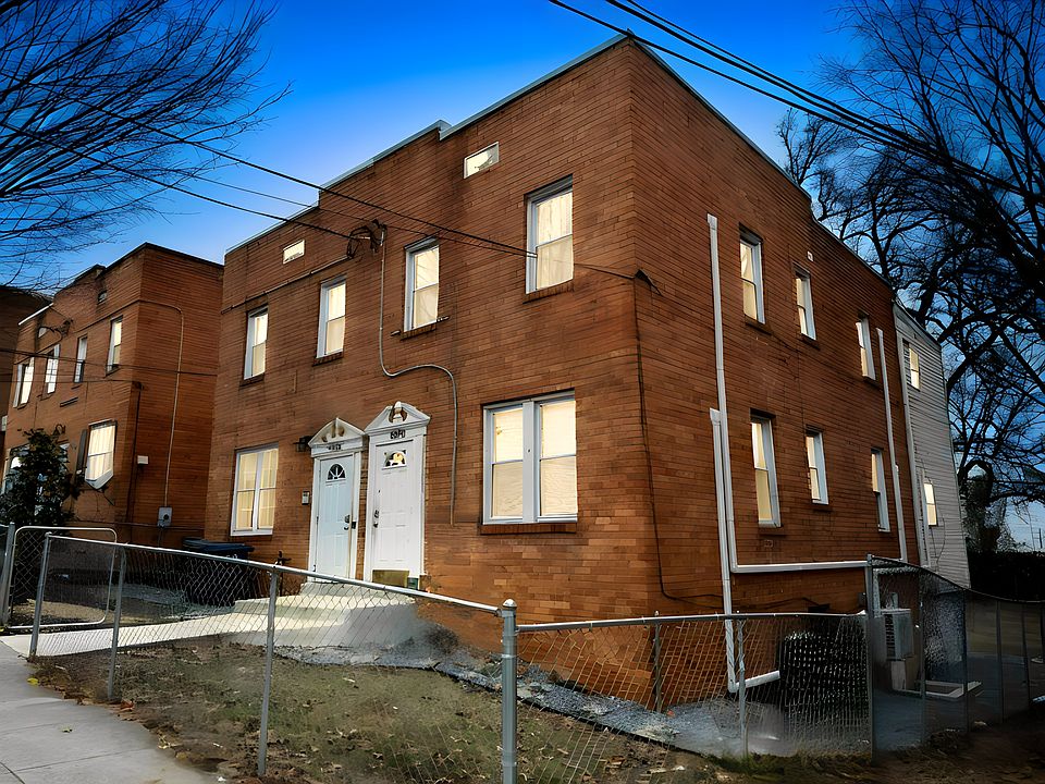 Charming brick duplex in Deanwood! Updated entry, fenced yard, and prime locationideal rental oppor