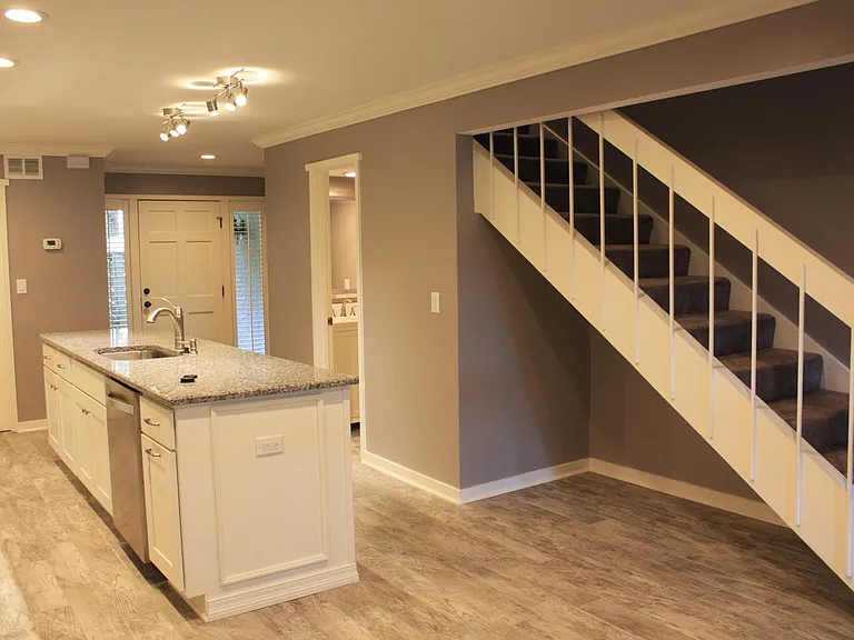 Stairs to bedrooms. Storage under stairs
