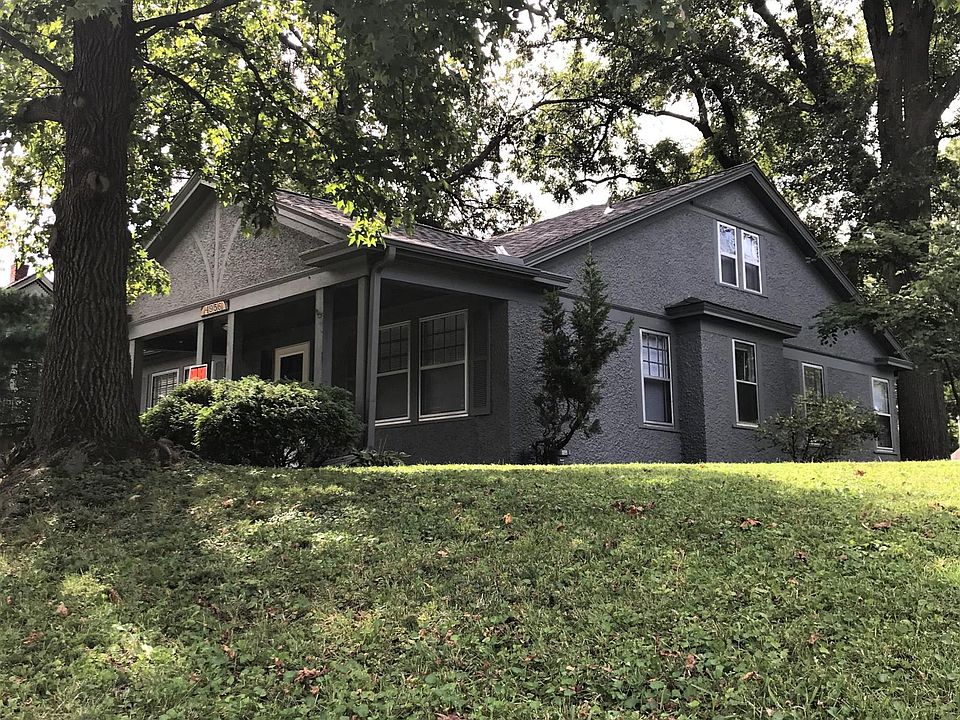 Exterior view from side yard and driveway entrance