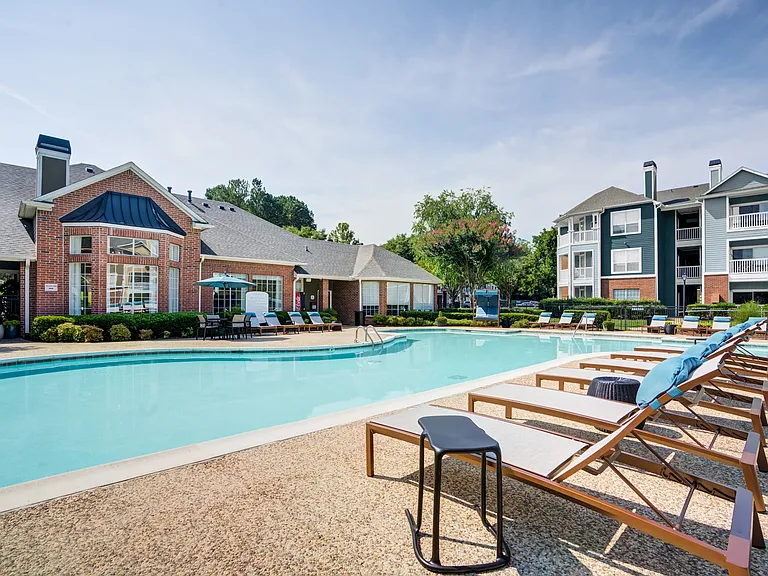 Relaxing Pool View with Lounge Chairs