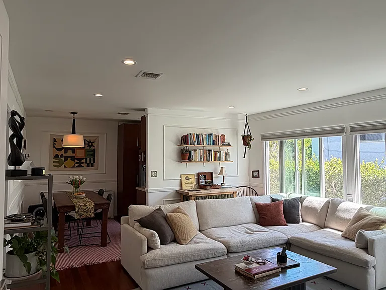 Living room with dining area in the corner