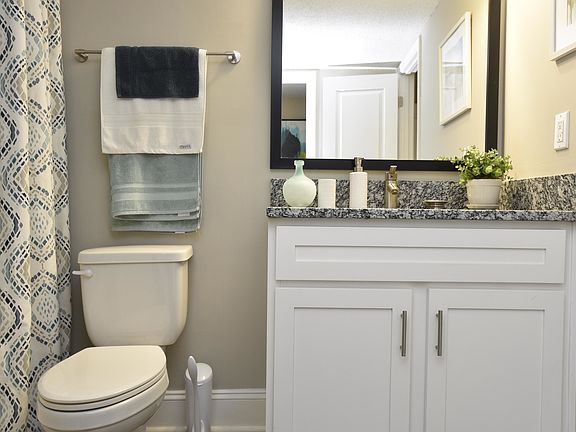 Experience elegance and functionality in this beautifully designed bathroom space.