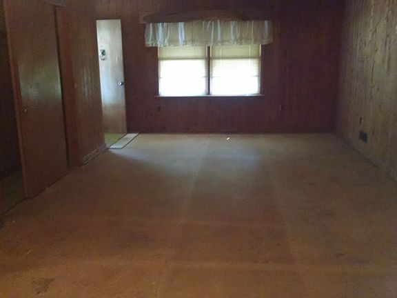 Den facing front of house