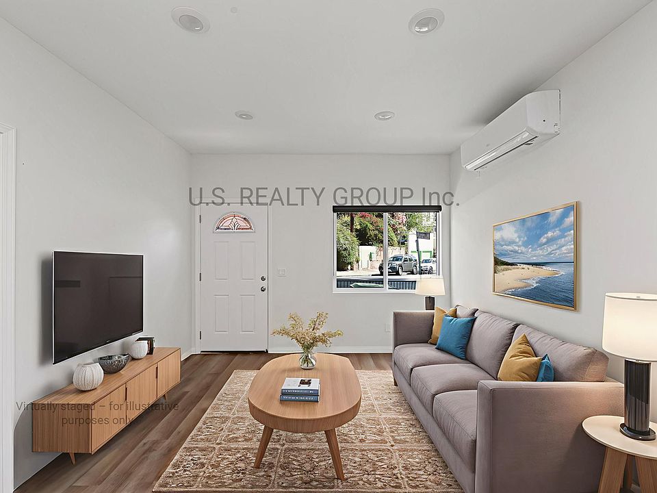 The front room as you enter. (the furniture is virtual staging).