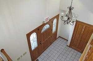 Front Foyer With Ceramic Tile Flooring