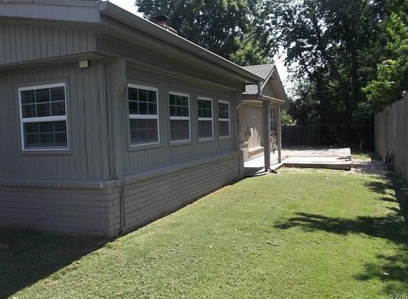 BACK VIEW OF HOME, THE ADDITION IS THE NEW BREAKFAST ROOM OFF OF KITCHEN, COULD ALSO BE A SECOND FORMAL DINING.