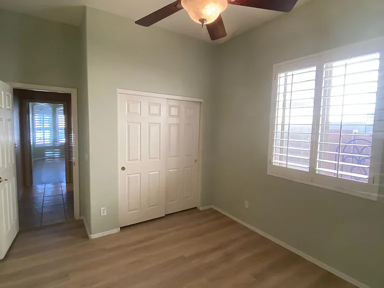 Bedroom 1-lots of natural light. Brand new L.V.P. flooring and fresh paint. Picture taken November 13, 2023 during afternoon.