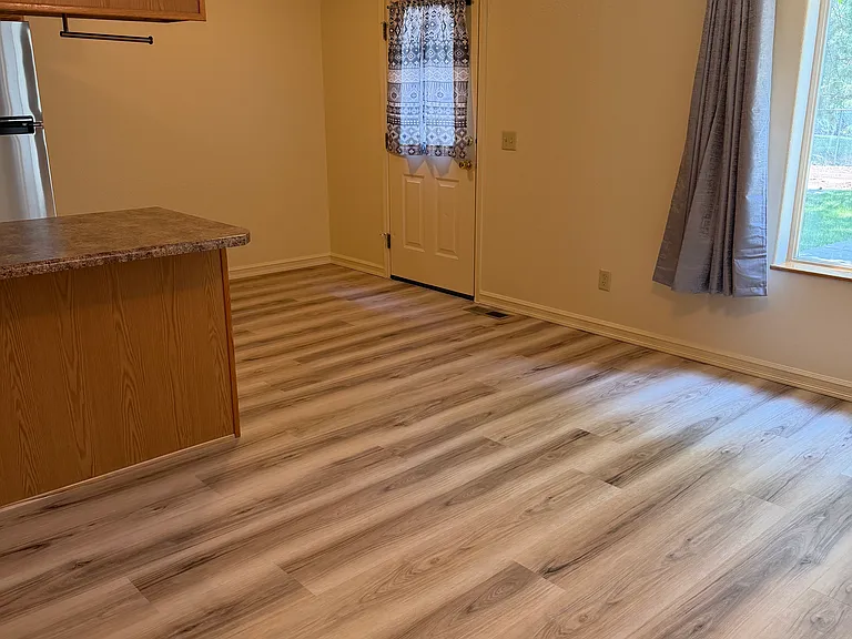 Living room with view to back yard.