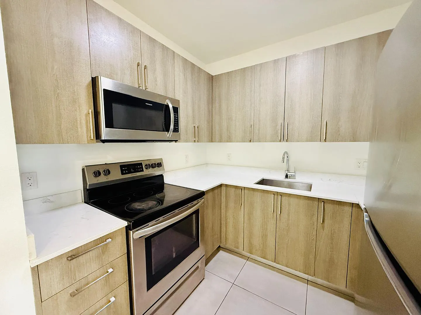 1295 W 69 ST - 304 — Photo 1