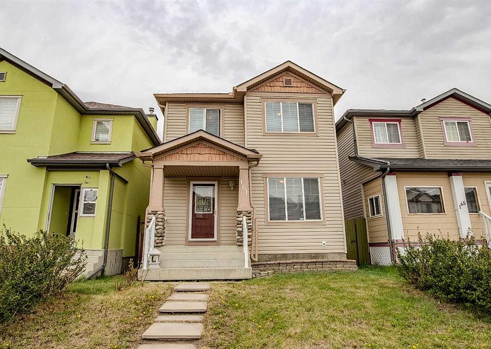 1st image of 161 N Saddlecrest Close NE