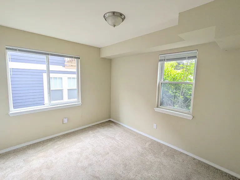 Room #3 with two windows and closet