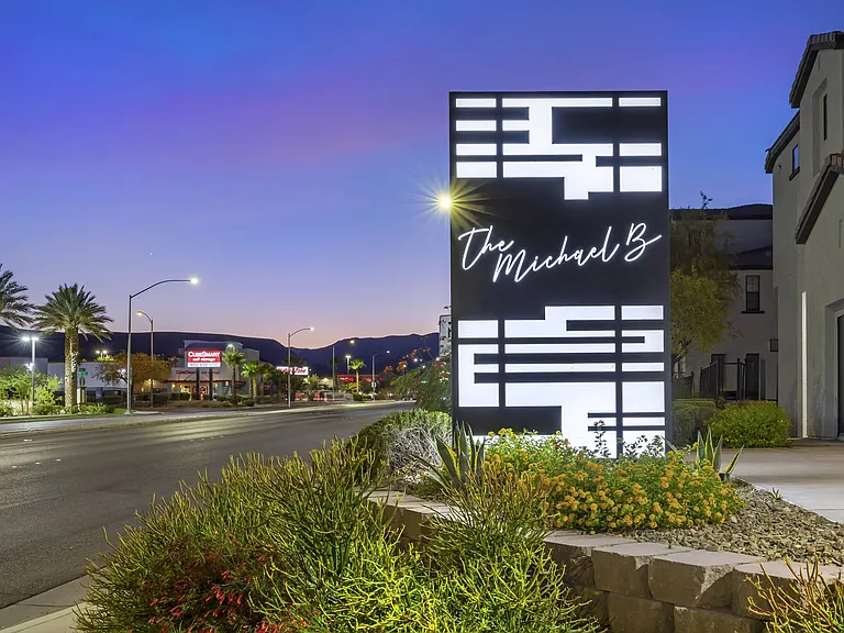 As the sun sets and the skies turn to hues of twilight, The Michael B welcomes all who pass by with its glowing lighted sign along the street.