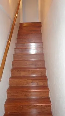 Wood stairway to 350 sf finished basement