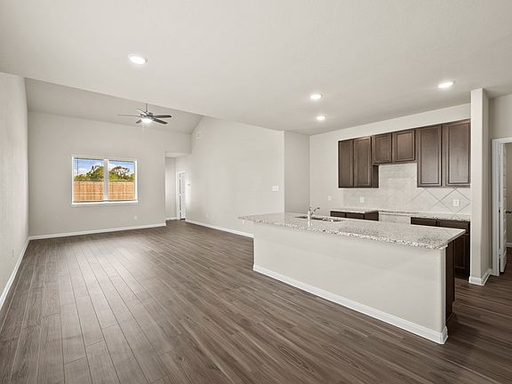 Dining Area to Kitchen and Family Room