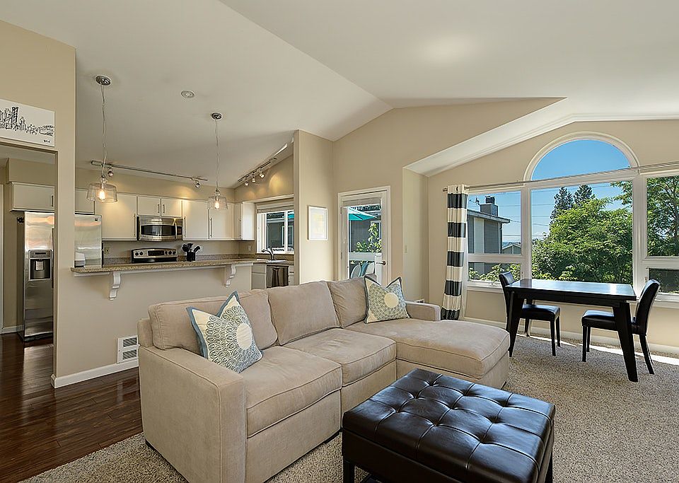 Vaulted ceilings in your living room and tons of natural lig