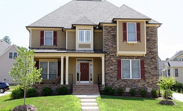 Front of house with covered porch