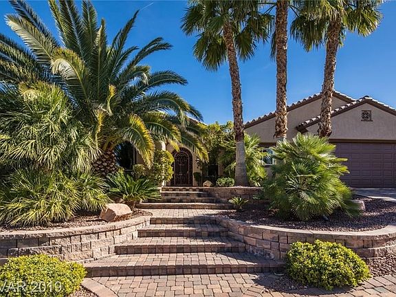 Great curb appeal with lush, mature landscape