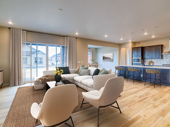 The Virtue features a spacious, open floorplan that seamlessly connects the gathering room, kitchen,