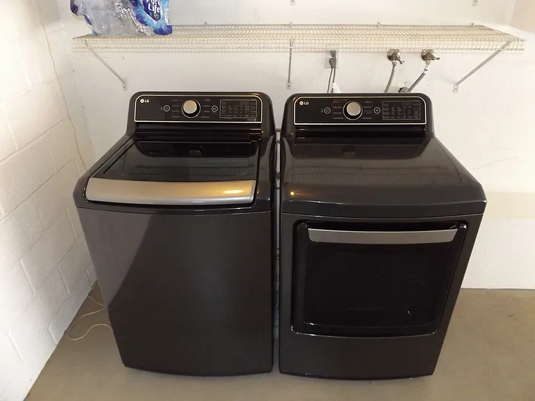 New laundry appliances in garage