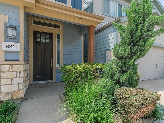 The North facing door with a top and side light, limestone and fiber cement siding and cedar beam accent the front porch. Front yard maintenance is included with your HOA dues!