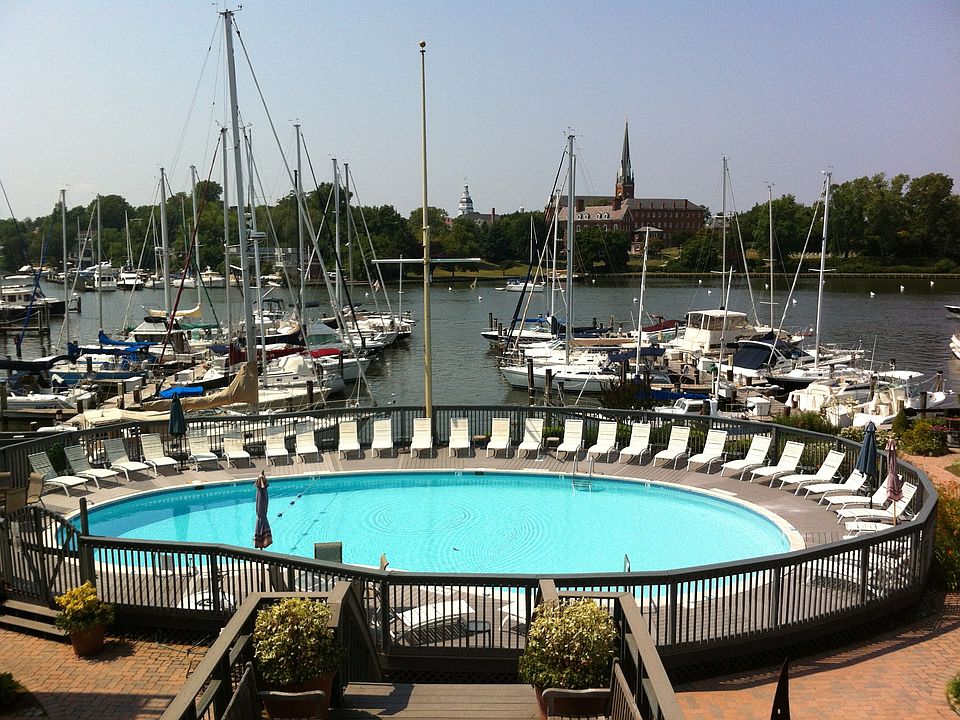 View of pool, marina, and Spa Creek from deck