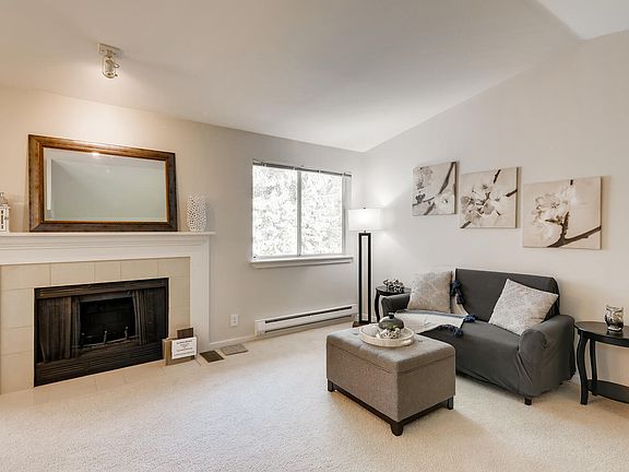 Windows open onto private + quiet landscaped area!