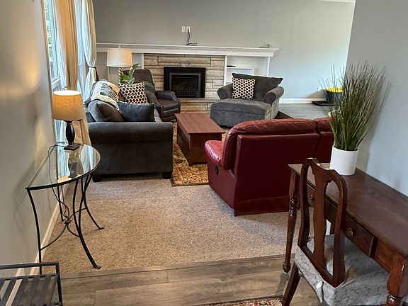 Step into the spacious, furnished living room
