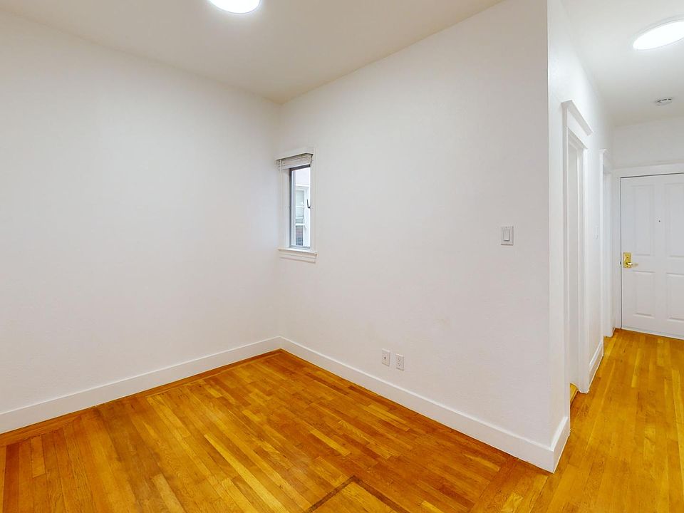 Bedroom with wood-like flooring