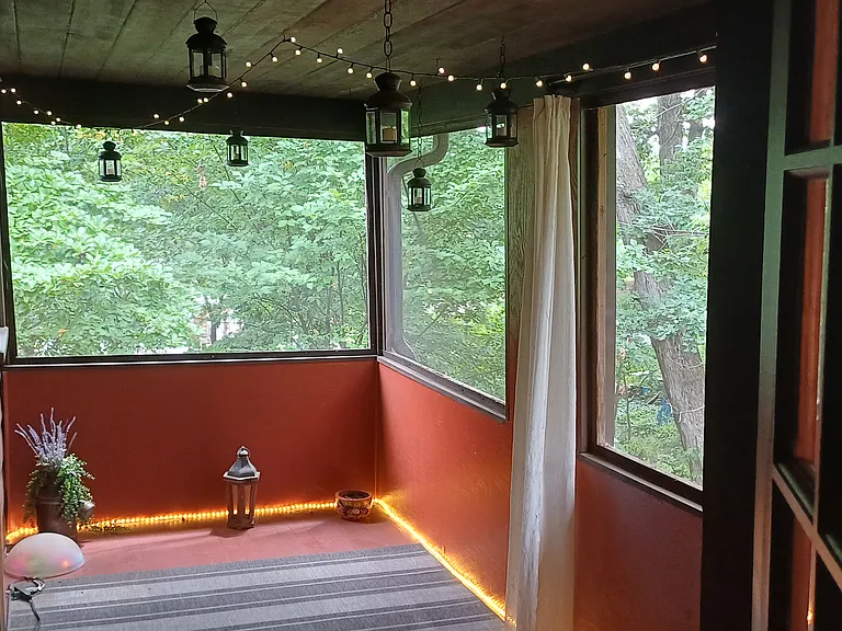 Step through the dutch-door for coffee or a relaxing beverage in the 8'x16' screened porch.
